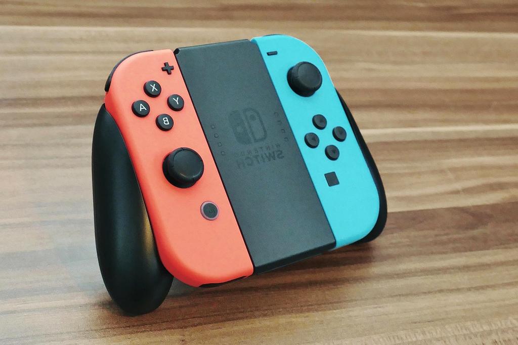 Cutting-edge gaming computers with neon lights and ultra-wide screens